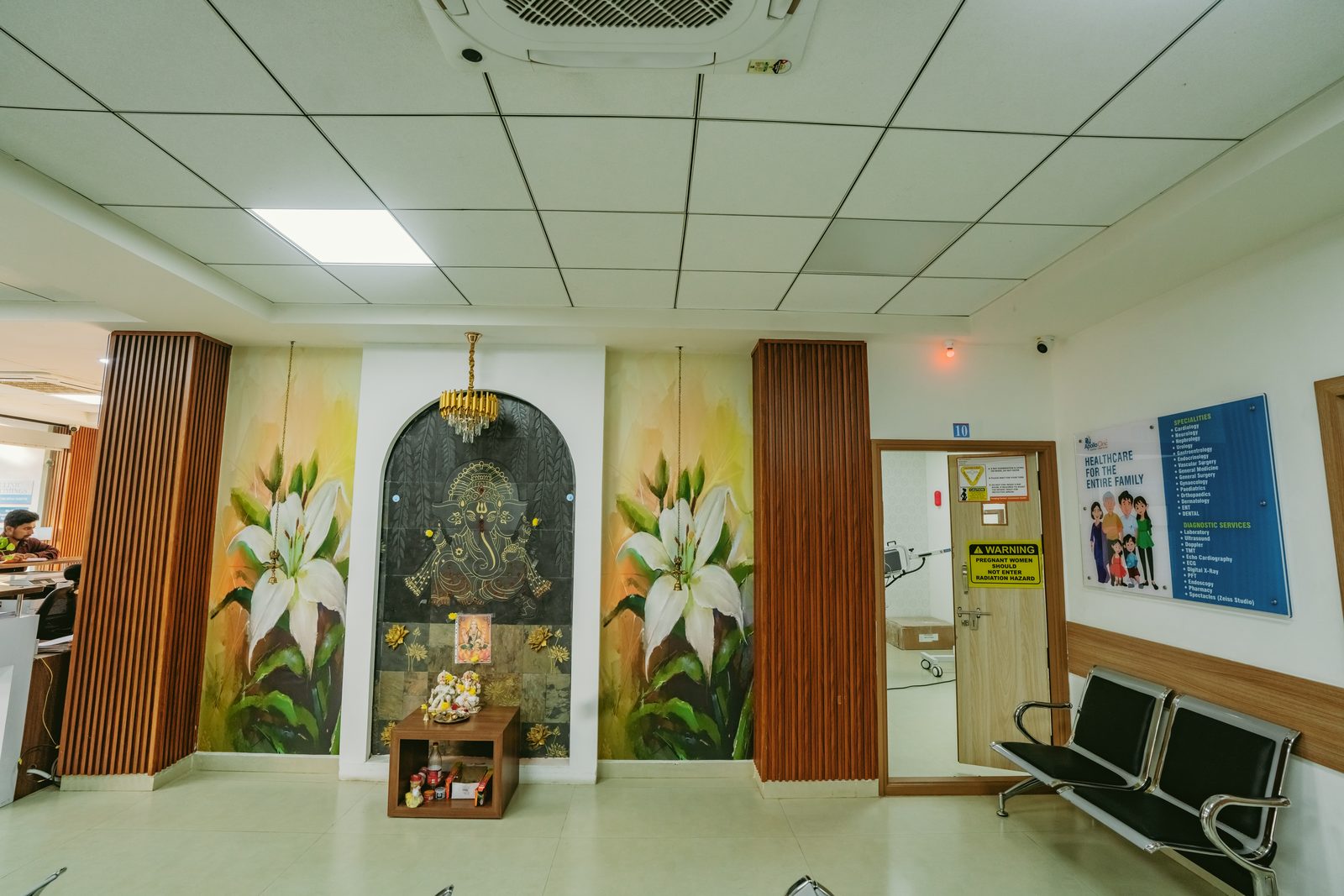 Waiting area with floral lily mural