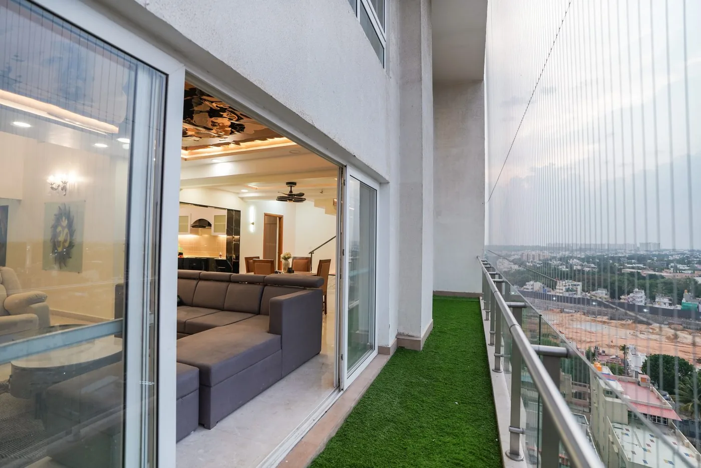 Full-height glazing beside a completed residential staircase